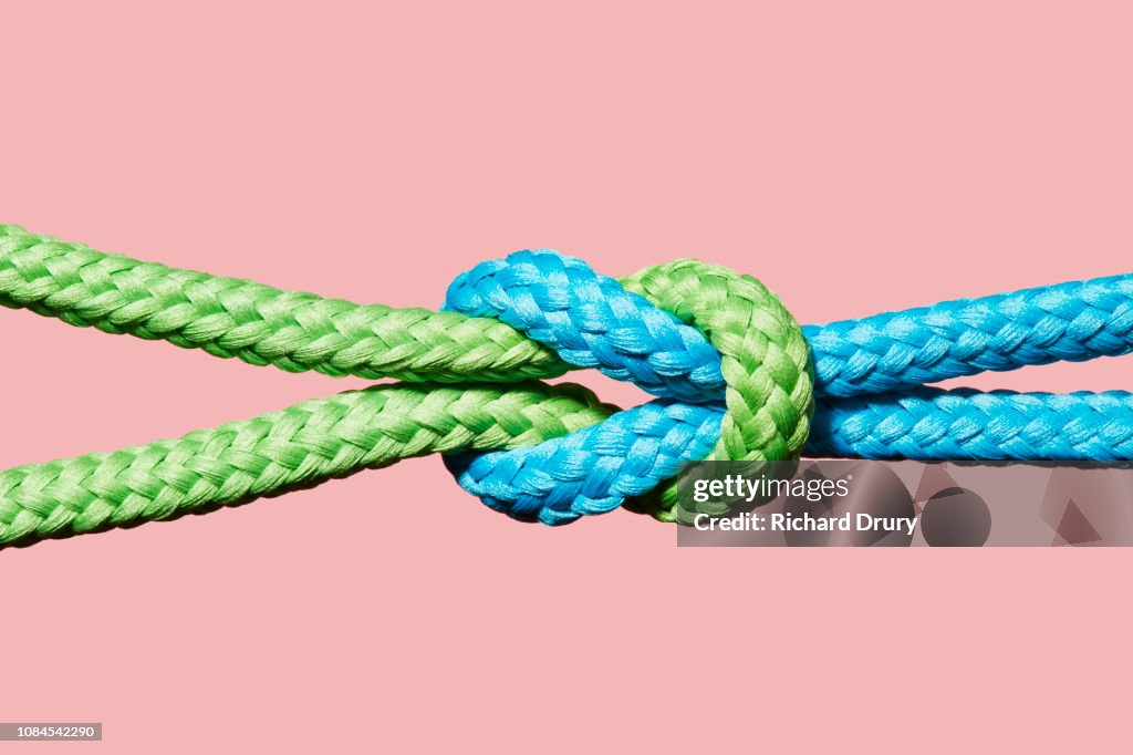 Two coloured ropes knotted together