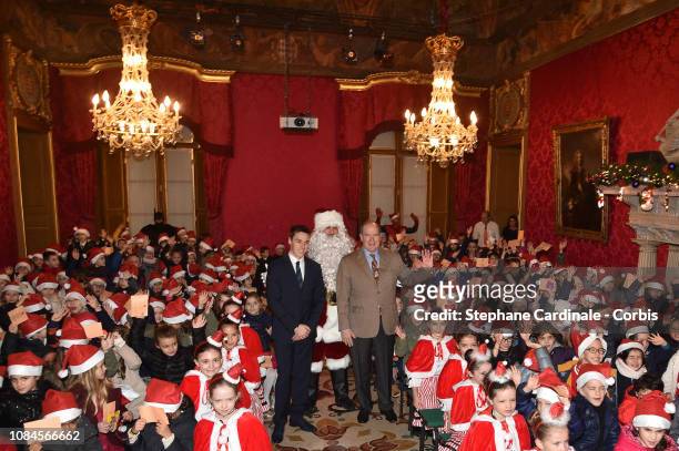 Louis Ducruet and Prince Albert II of Monaco attend the Christmas Gifts Distribution on December 19, 2018 in Monte-Carlo, Monaco.