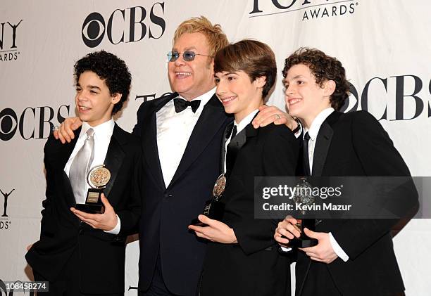 Elton John and David Alvarez, Kirl Kulish and Trent Kowalik of "Billy Elliot" pose in the press room during the 63rd Annual Tony Awards at Radio City...