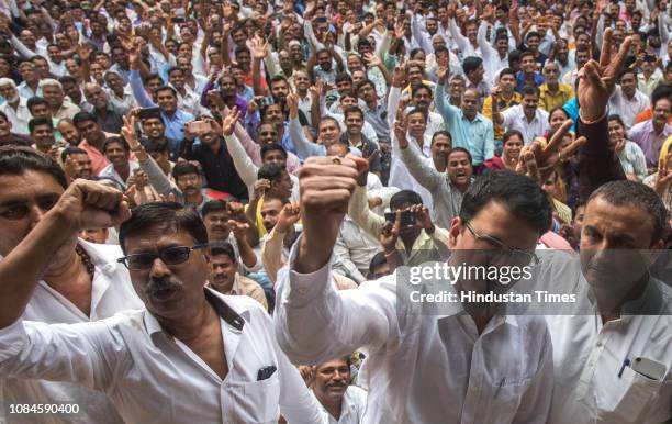 Union leader Shashank Rao along with other union members and BEST workers celebrates after called off the nine days long strike in the rally at...