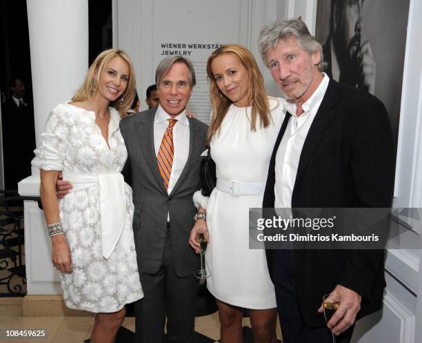 Dee Ocleppo and designer Tommy Hilfiger pose with Laurie Durning and musician Roger Waters at their engagement party hosted by Leonard and Evelyn...