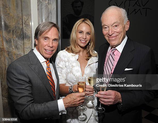Designer Tommy Hilfiger and Dee Ocleppo with Chairman and Senior Corporate Vice President of Estee Lauder Companies Inc. Leonard Lauder at their...