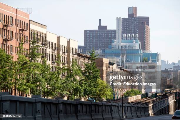 Manhattan, New York USA View looking across railroad tracks to 125th Street Station, apartment buildings and the Jerome L Green Science Center The...