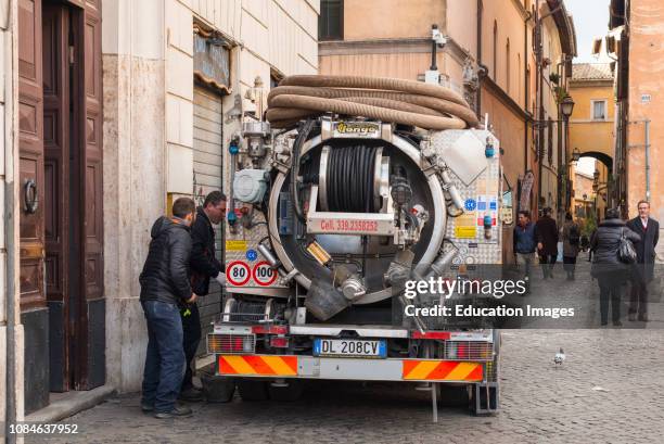 Sewage truck in central Rome, Lazio, Italy.