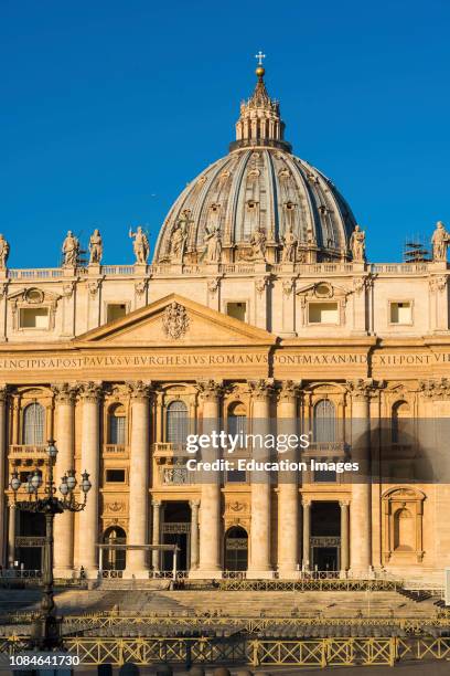 Papal Basilica of Saint Peter at St Peters square in early morning light, Vatican City, Rome, Italy.