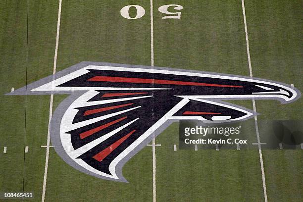 Detail of the Atlanta Falcons logo is seen at the 50 yard line against the Green Bay Packers during their 2011 NFC divisional playoff game at Georgia...