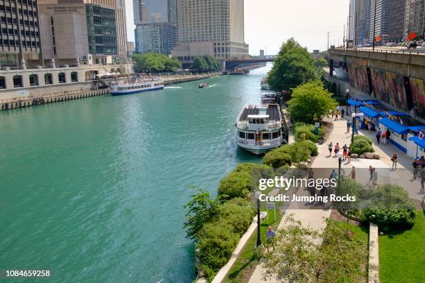 Chicago River and The River walk and surrounding downtown architecture in summer, Chicago, Illinois.