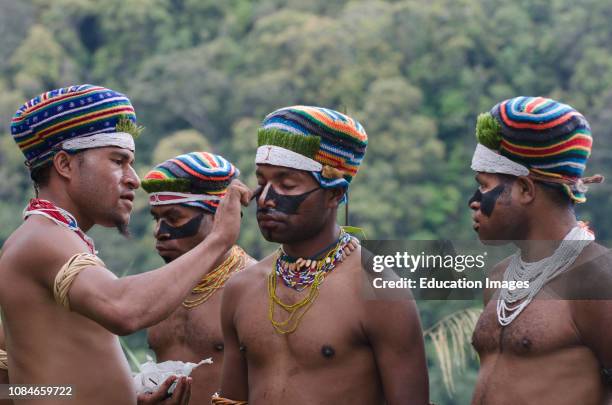 Western Highlanders preparing for a Sing-sing at the Paiya Show in the Western Highlands near Mt Hagen, Papua New Guinea.