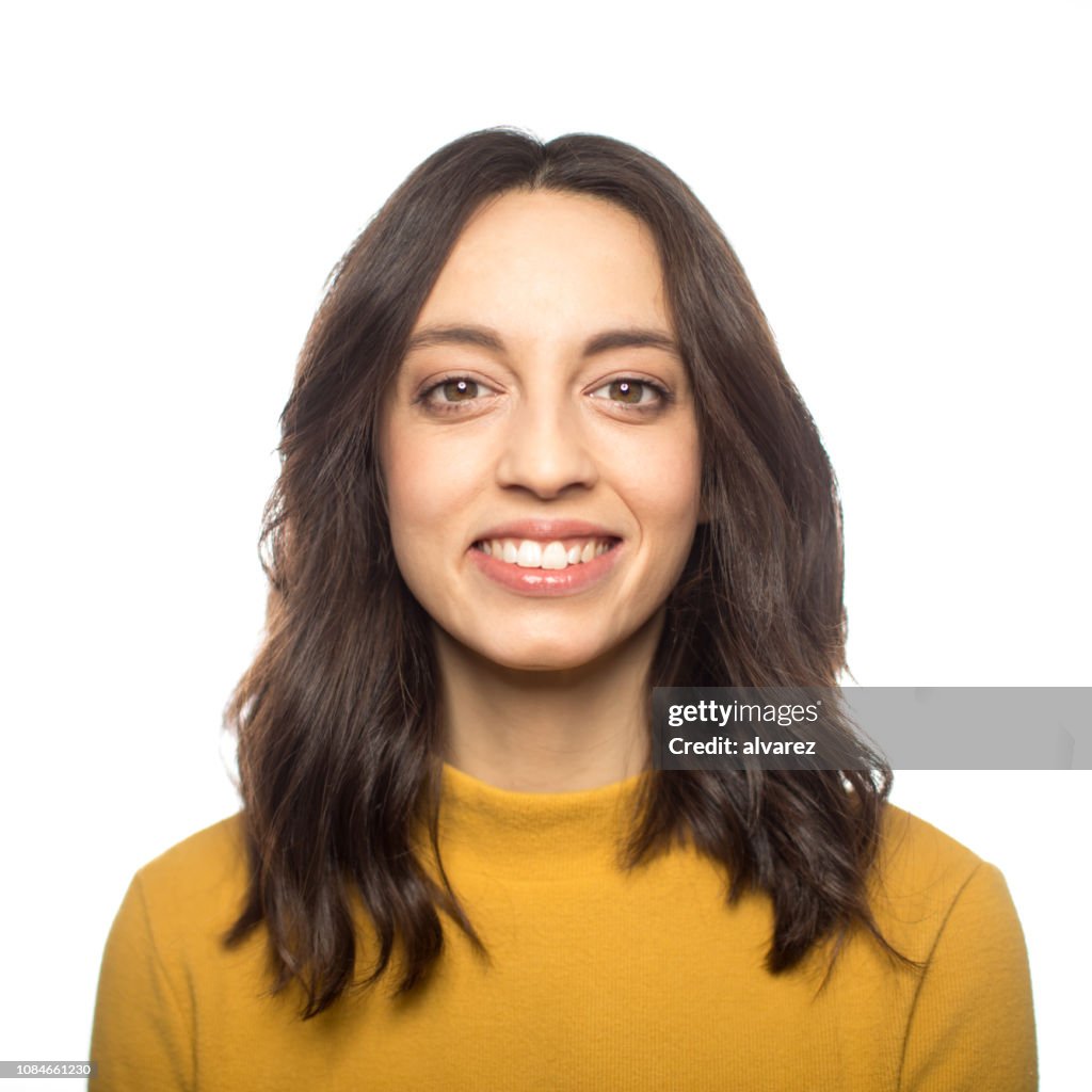 Elegant woman smiling on white background