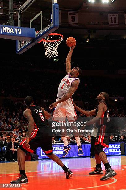 Amar'e Stoudemire of the New York Knicks lays the ball up against the Miami Heat at Madison Square Garden on January 27, 2011 in New York City. NOTE...