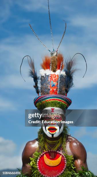 Tribal performers from the Anglimp District in Waghi Province performing at a Sing-sing, Hagen Show Western Highlands, Papua New Guinea, with bird of...