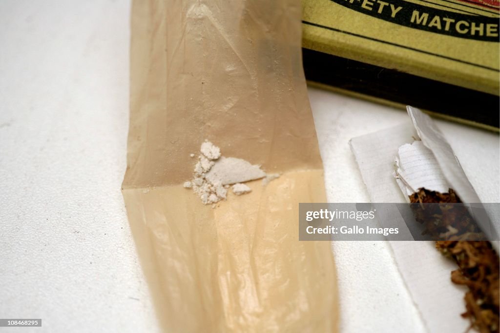 A whoonga addict makes his joint on July 22, 2010 near Durban, South ...