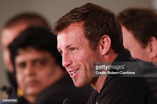 Australian captain Lucas Neill talks to the media during an offical pre-match media conference at Khalifa Stadium on January 28, 2011 in Doha, Qatar.