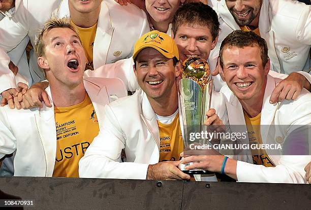 Australian Captain Ricky Ponting and the Australian team poses with the trophy as they celebrate after winning the ICC Champions trophy on October 5,...