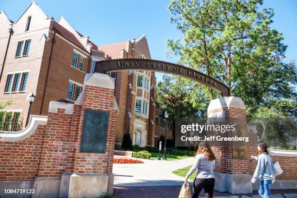 Gainesville, University of Florida, campus entrance with students.