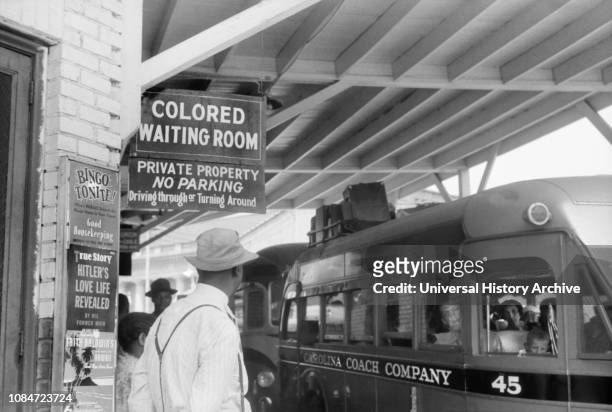 Bus Station with Sign "Colored Waiting Room", Durham, North Carolina, USA, Jack Delano, Office of War Information, May 1940.