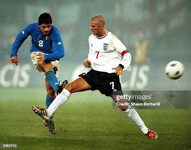 Gennaro Ivan Gattuso of Italy shoots to score past David Beckham of England during the match between Italy and England in an international friendly...