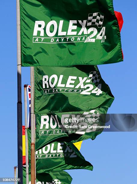 Flags are displayed during practice for the Rolex 24 at Daytona at Daytona International Speedway on January 28, 2011 in Daytona Beach, Florida.