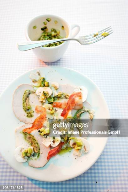 turkey roulade carpaccio, mushrooms and baco with an avocado and courgette dressing - baco stock pictures, royalty-free photos & images