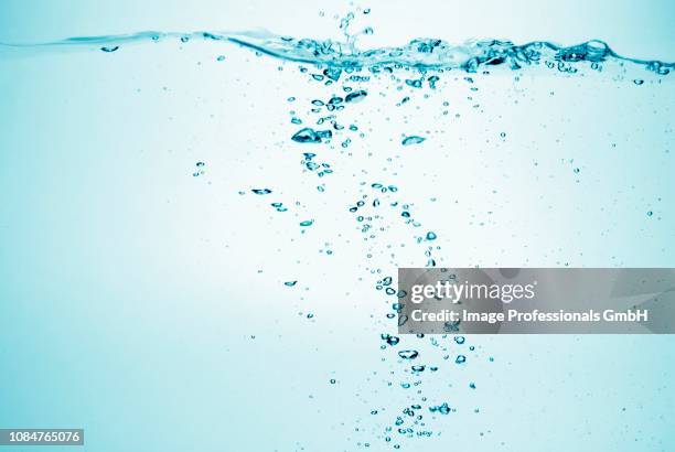 ripple and bubbles of water - water ripple stock-fotos und bilder