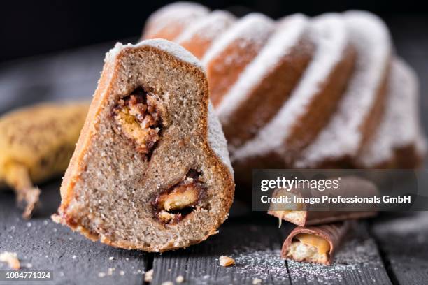 gugelhupf with chocolate and caramel biscuit bars - chocó department colombia stock pictures, royalty-free photos & images