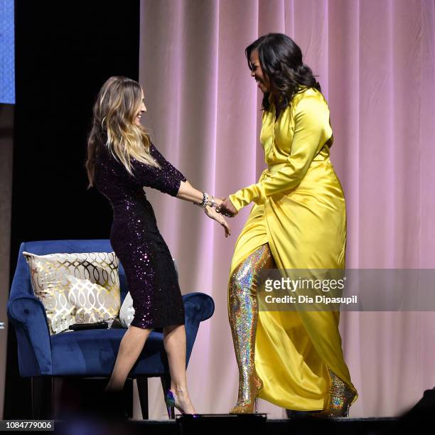 Former first lady Michelle Obama discusses her book "Becoming" with Sarah Jessica Parker at Barclays Center on December 19, 2018 in New York City.