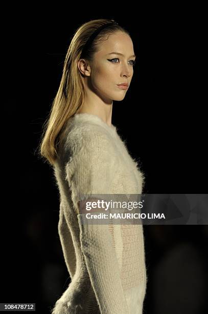 Brazilian model Raquel Zimmermann presents a creation by Animale during the opening day of the 2011-2012 Fall-Winter collections of the Sao Paulo...
