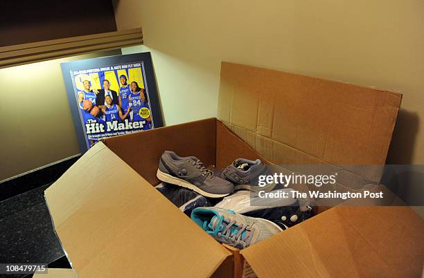 December 13: A box of shoes from his shoe sponsor Reebok sit in the corner of Washington Wizards point guard John Wall's Washington, DC apartment on...