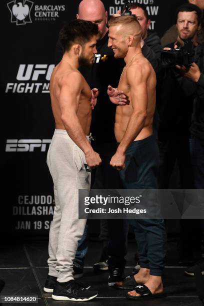 Henry Cejudo and TJ Dillashaw face off during the UFC Fight Night weigh-in iat Barclays Center on January 18, 2019 in the Brooklyn borough of New...