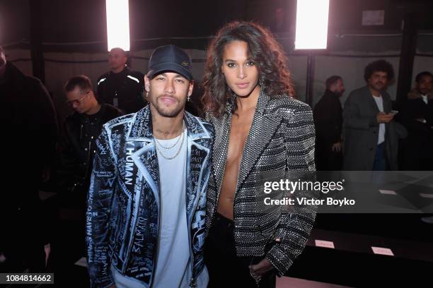 Neymar and Cindy Bruna attend the Balmain Homme Menswear Fall/Winter 2019-2020 show as part of Paris Fashion Week on January 18, 2019 in Paris,...