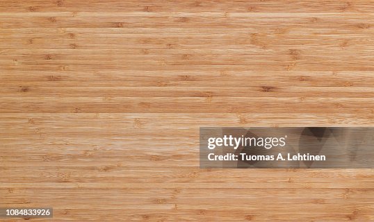 Full frame background of natural unpainted bamboo wood board Full frame background of natural unpainted bamboo wood board