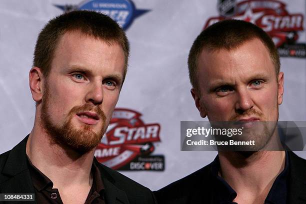 Daniel Sedin and Henrik Sedin of the Vancouver Canucks answer questions during NHL All Star Player Media Availability apart of the 2011 NHL All-Star...