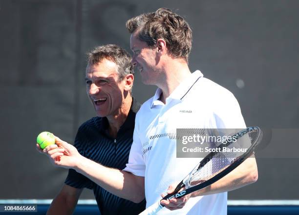 Mats Wilander and Thomas Enqvist of Sweden in his Men's Legends Doubles with Thomas Enqvist against Mansour Bahrami of Iran and Mark Philippoussis of...