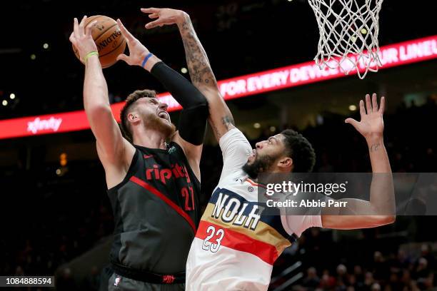 Jusuf Nurkic of the Portland Trail Blazers takes a shot against Anthony Davis of the New Orleans Pelicans in the first half during their game at Moda...
