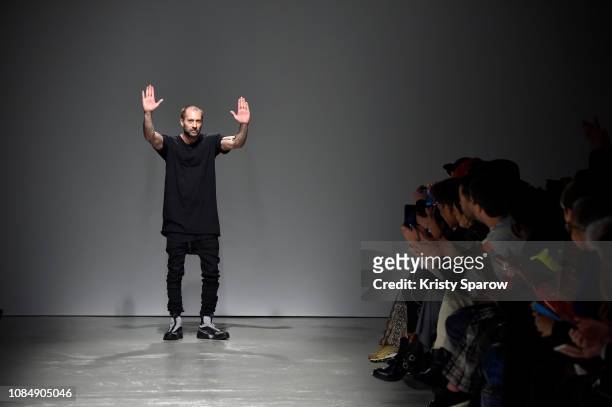 Designer Boris Bidjan Saberi acknowledges the audience during the Boris Bidjan Saberi Menswear Fall/Winter 2019-2020 show as part of Paris Fashion...