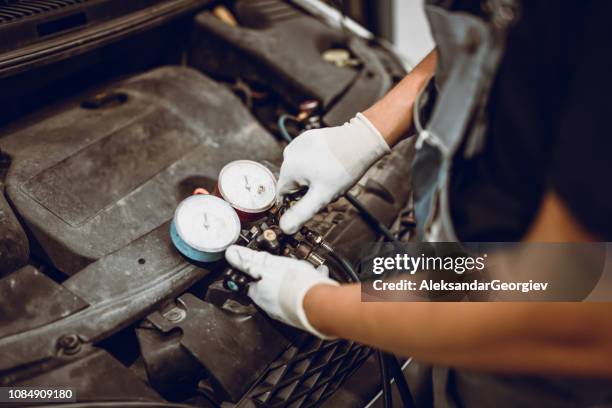 freon recharging measure equipment - old electric meter stock pictures, royalty-free photos & images