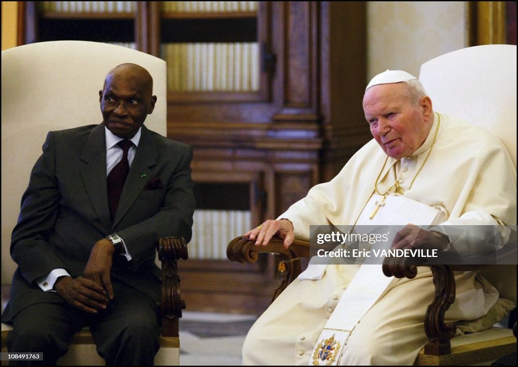 Pope John Paul II received Senegal's President Abdoulaye Wade and his wife Karim in Rome, Italy on May 13th, 2004.