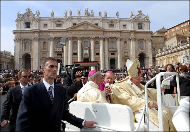 Pope John Paul II canonizes Opus Dei founder Jose Maria Escriva de Balaguer before one of the biggest crowds ever to flood the Vatican in Rome, Italy...