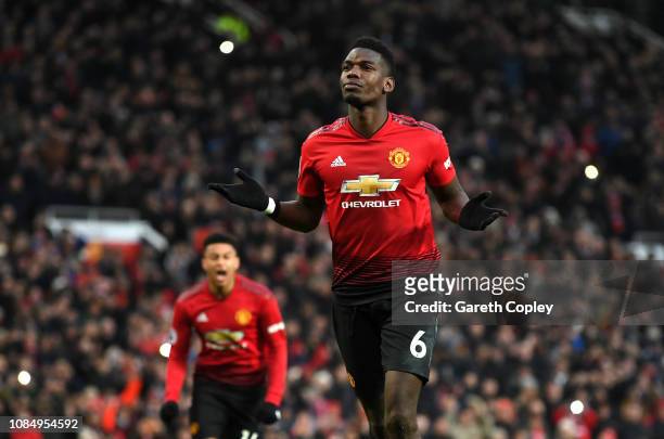 Paul Pogba of Manchester United celebrates after scoring his team's first goal during the Premier League match between Manchester United and Brighton...