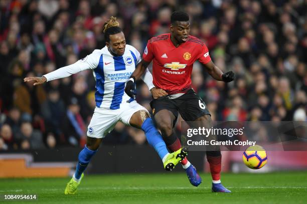 Paul Pogba of Manchester United is fouled by Gaetan Bong of Brighton and Hove Albion and a penalty is later given to Manchester United during the...