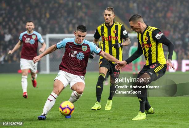 Burnley's Ashley Westwood competing with Watford's Sebastian Prodl during the Premier League match between Watford FC and Burnley FC at Vicarage Road...