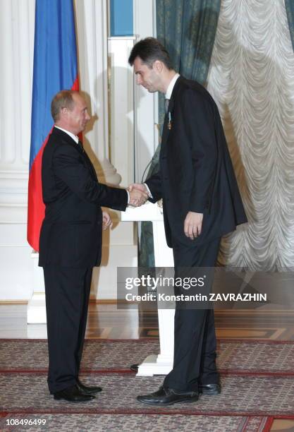 Russian President Vladimir Putin awards Mikhail Prokhorov, CEO of the steel plant "Norilski Nikel", in Kremlin, Mikhail Prokhorov ranked 89 among The...