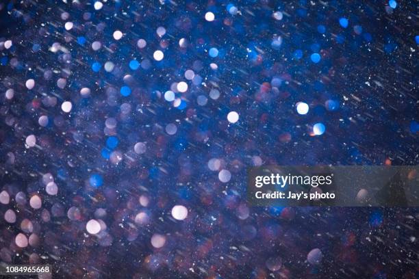 city abstract at night with snow - fall party inside stock-fotos und bilder