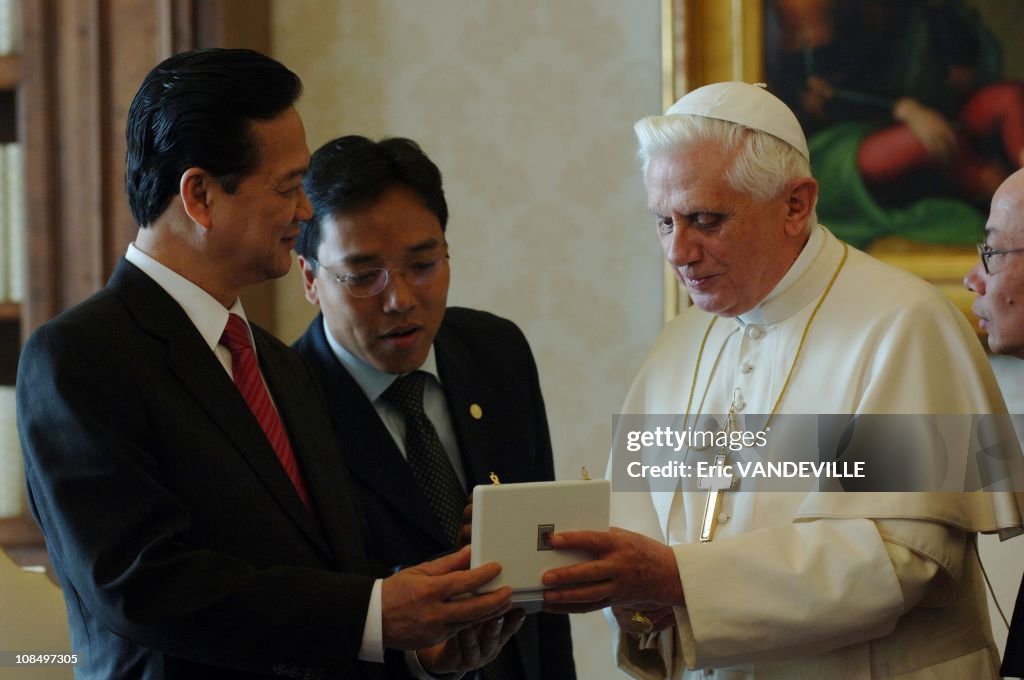 Pope Benedict XVI meets communist Vietnam's Prime Minister Nguyen Tan Dung during a private audience in Rome, Vatican City on January 25, 2007.