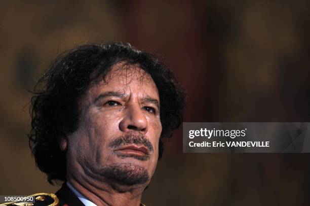 At the Quirinale Palace , Libyan leader Moammar Gadhafi has hailed a 'new era' in relations with Italy during his first visit to his country's former...