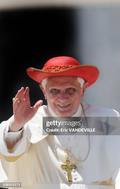 Sunny day in Rome: Pope Benedict XVI wears his red Saturn hat , named after the ringed planet Saturn, at the end of the weekly general audience in...