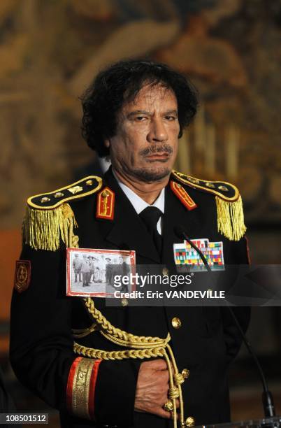 At the Quirinale Palace , Libyan leader Moammar Gadhafi has hailed a 'new era' in relations with Italy during his first visit to his country's former...