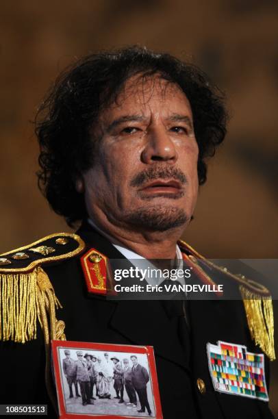 At the Quirinale Palace , Libyan leader Moammar Gadhafi has hailed a 'new era' in relations with Italy during his first visit to his country's former...
