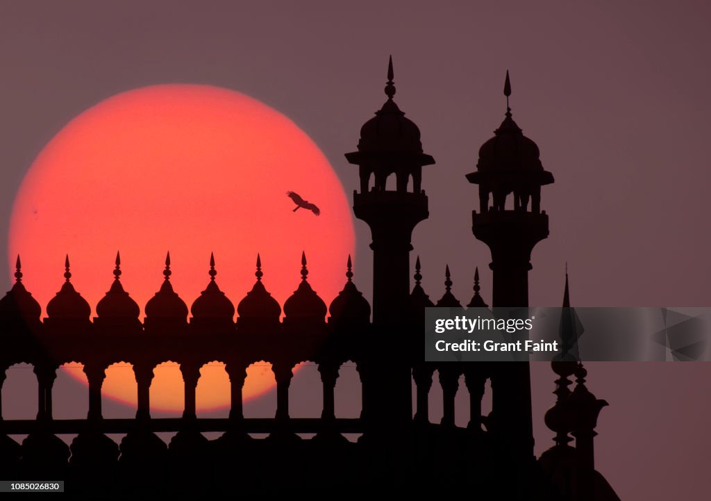 Partial view of mosque at sunset.