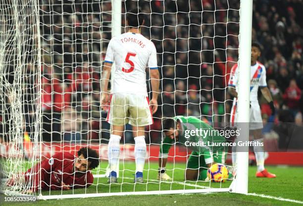 Mohamed Salah of Liverpool reacts after scoring his sides third goal during the Premier League match between Liverpool FC and Crystal Palace at...